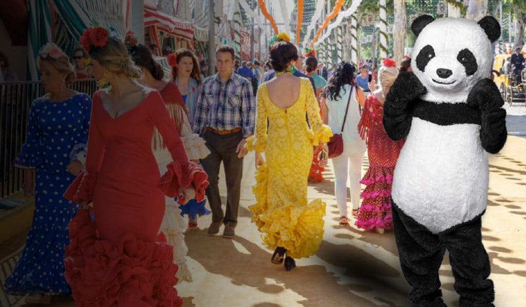 Un oso panda gigante baila en una caseta de la Feria